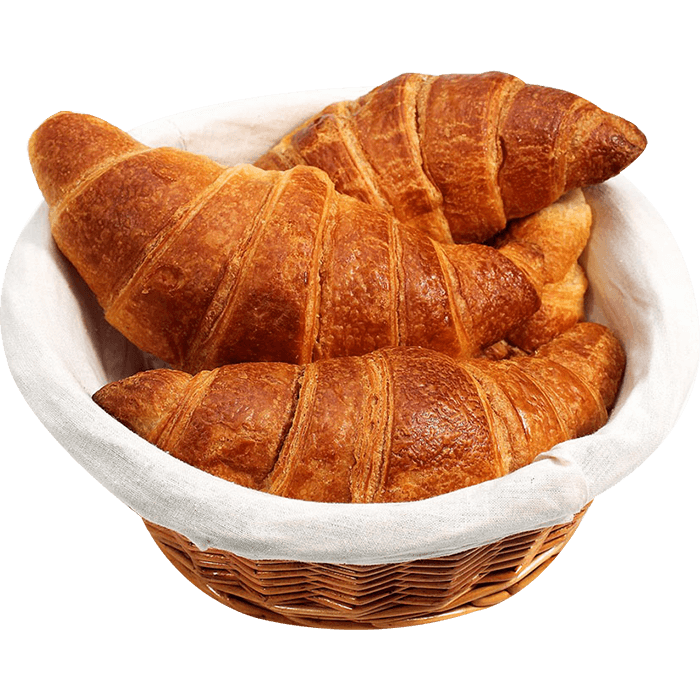 Kosher croissants arranged in a basket against a black background. Richmond Kosher Bakery